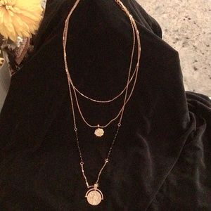 Gold tone triple chain&black bead necklace with pendants. Adjust to 18”